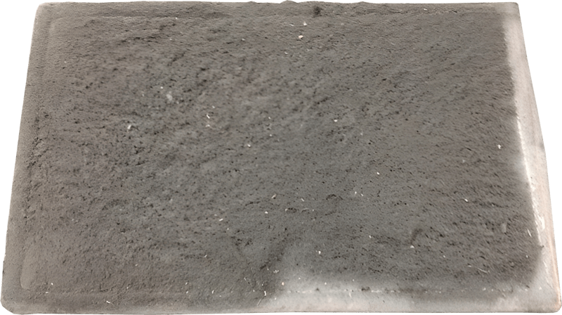A Photograph of a Dirty MVHR Filter that has collected dirt and needs to either be cleaned or replaced